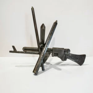 Une arme à feu qui croise le fer avec des crayons