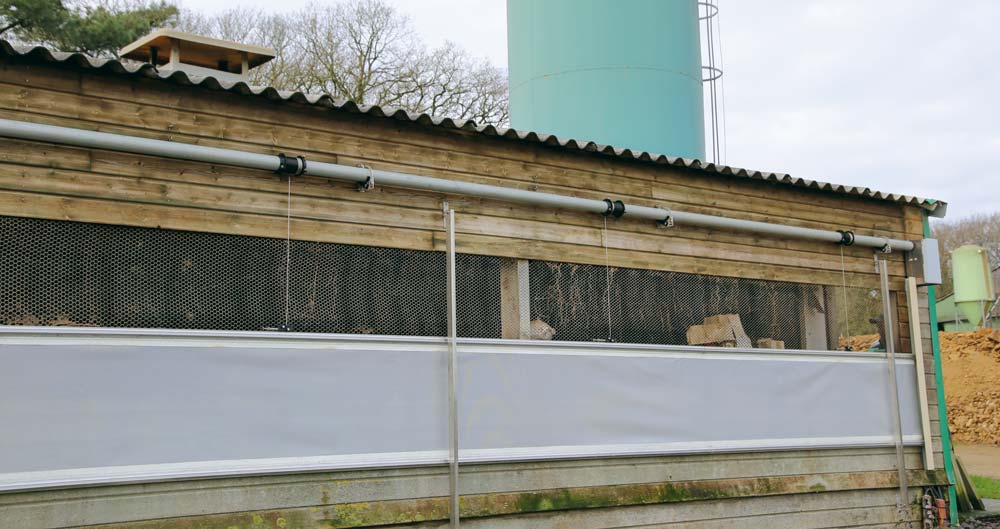 Un bâtiment porc renouvelé grâce aux filets brise-vent