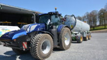 Tracteur New Holland au biogaz avec une tonne à l'arrière