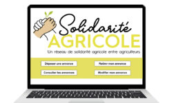 Un ordinateur portable avec, à l'écran, un outil de solidarité agricole